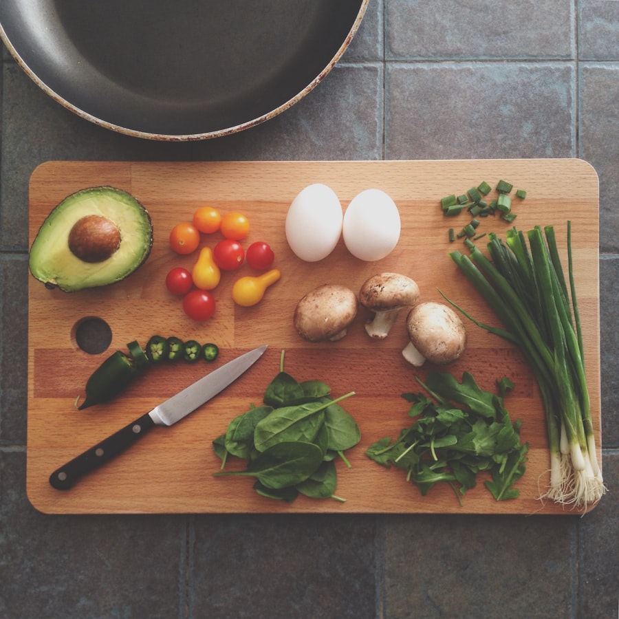 Fresh vegetable trimmings on a wooden board
